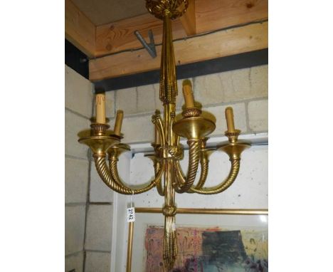 A gilded ceiling light.