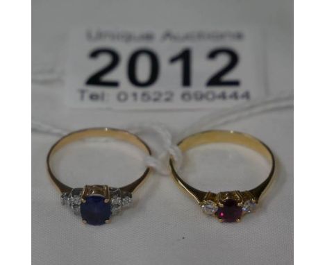 2 gold rings - on set with sapphires and diamonds (hall mark worn) the other set with ruby and diamonds (marked 750, 18k).