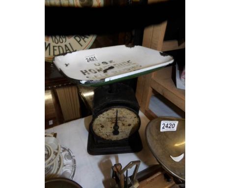 A set of 1930's Homepride kitchen scales with enamel advertising pan.