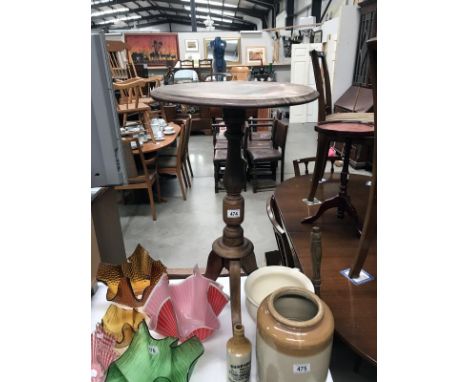 A Victorian mahogany tripod wine table