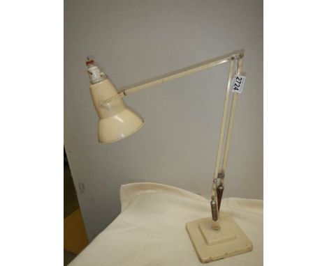 A vintage angle poise lamp.