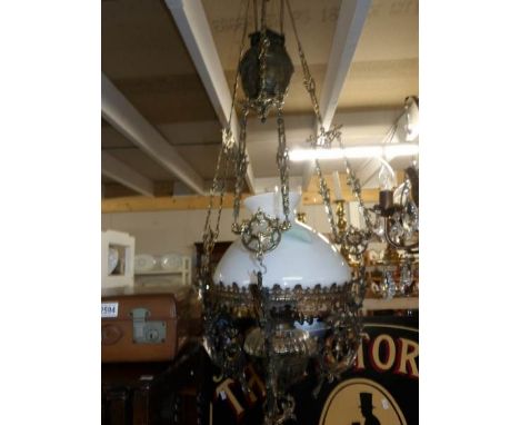 A Victorian hanging oil lamp with shade,.