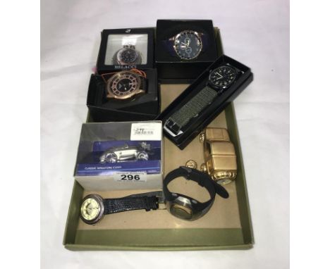 A box of wristwatches including model car and clocks