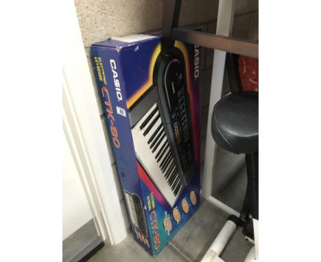 A boxed Casio electronic keyboard CTK-80