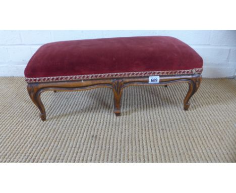 A late 19th/early 20th century French cabriole leg foot stool with upholstered - Height 21cm x Width 53cm - Repair to one leg