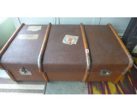 A canvas and wooden travelling trunk/storage box - in good condition