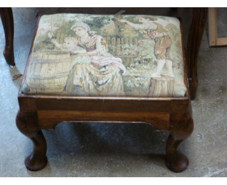 A walnut stool on dwarf cabriole legs in good condition