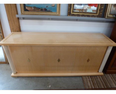 A Turri three door maple veneer sideboard with pillar supports - Height 79cm x 190cm x 50cm