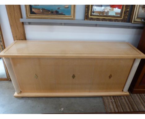 A Turri three door maple veneer sideboard with pillar supports - Height 79cm x 190cm x 50cm