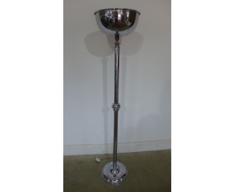 A chrome up lighter - Height 146cm x Diameter 30cm