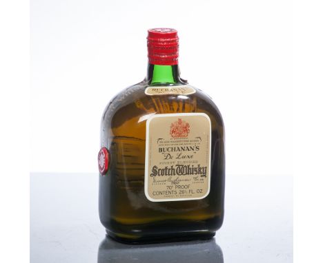 BUCHANAN'S DE LUXE
Blended Scotch Whisky by James Buchanan. D8/67, in embossed bottle with clasp seal. 26 2/3 fl oz, 70° Proo