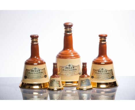 FIVE BELL'S DECANTERS
Blended Scotch Whisky in wade decanters, 75cl (1), 37.5cl (2) and miniature size with no volume stated 