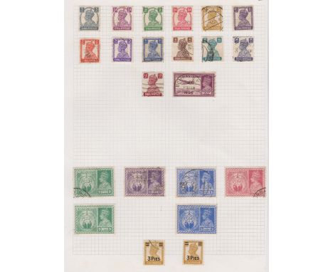 India 1883-1946 collection of m/m and used on three pages. Two pages of officials opts. Cat value £35.90