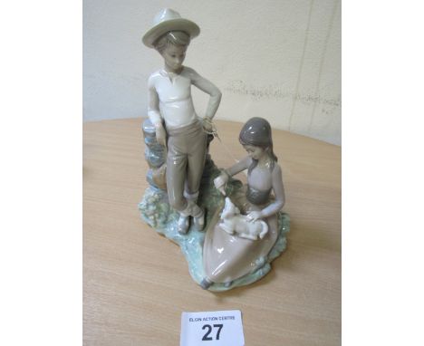  Sale Item:    LLADRO FIGURINE FEEDING THE LAMB   Vat Status:   No Vat   Buyers Premium:  This lot is subject to a Buyers Pre