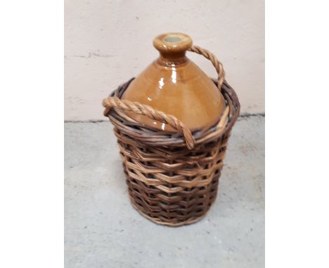  Sale Item:    FLAGON IN WICKER CASING (AF)   Vat Status:   No Vat   Buyers Premium:  This lot is subject to a Buyers Premium