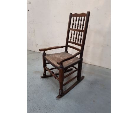  Sale Item:    OAK ROCKING CHAIR C/W RUSH SEAT   Vat Status:   No Vat   Buyers Premium:  This lot is subject to a Buyers Prem