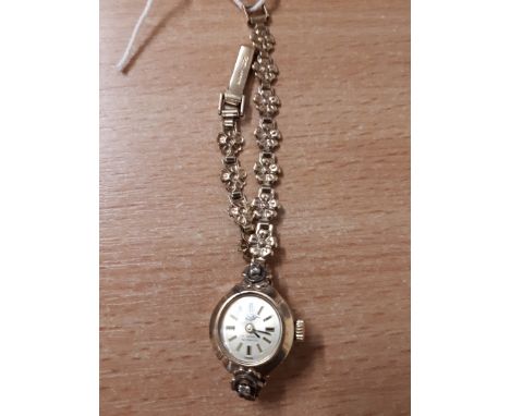  Sale Item:    LADIES 9 CT GOLD COCKTAIL WATCH   Vat Status:   No Vat   Buyers Premium:  This lot is subject to a Buyers Prem