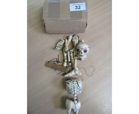  Sale Item:    SKELETON CERAMIC PUPPET (AF)   Vat Status:   No Vat   Buyers Premium:  This lot is subject to a Buyers Premium
