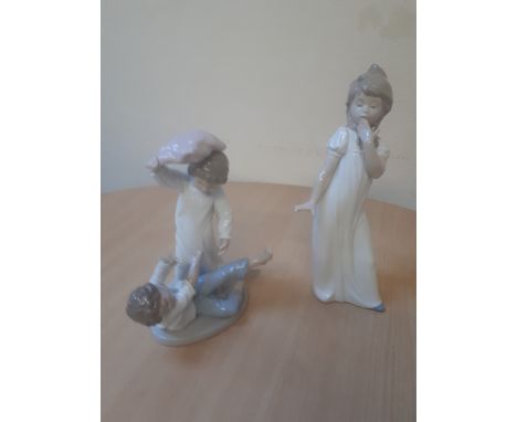 Sale Item:    2 NAO FIGURES   Vat Status:   No Vat   Buyers Premium:  This lot is subject to a Buyers Premium of 15% + Vat @