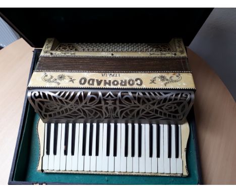  Sale Item:    CORONADO PIANO ACCORDIAN (AF)   Vat Status:   No Vat   Buyers Premium:  This lot is subject to a Buyers Premiu