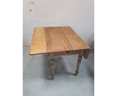  Sale Item:    PINE KITCHEN TABLE WITH DROP LEAVES (AF)  Vat Status:   No Vat   Buyers Premium:  This lot is subject to a Buy