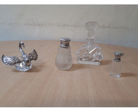  Sale Item:    SWAN DISH 925 2 SILVER TOP SCENT BOTTLES & CUT GLASS SCENT BOTTLE  Vat Status:   No Vat   Buyers Premium:  Thi