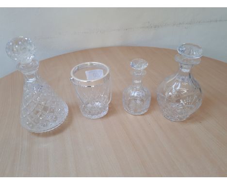  Sale Item:    3 CRYSTAL / GLASS DECANTERS & ICE BUCKET  Vat Status:   No Vat   Buyers Premium:  This lot is subject to a Buy