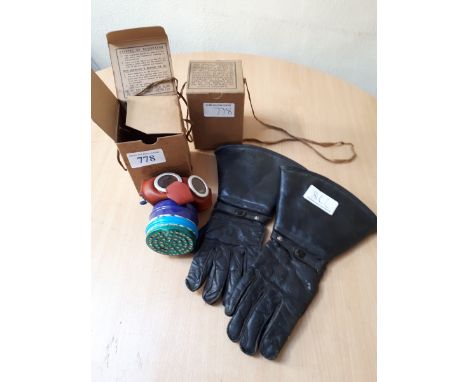  Sale Item:    2 BOXED GAS MASKS & LEATHER MOTORING GLOVES  Vat Status:   No Vat   Buyers Premium:  This lot is subject to a 