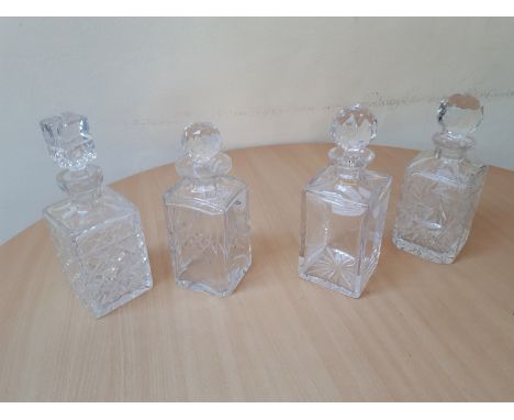  Sale Item:    4 CRYSTAL / GLASS DECANTERS (1 TOP AF)  Vat Status:   No Vat   Buyers Premium:  This lot is subject to a Buyer