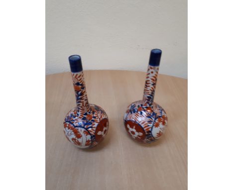  Sale Item:    PAIR IMARI SPILL VASES 19CMS   Vat Status:   No Vat   Buyers Premium:  This lot is subject to a Buyers Premium