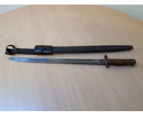  Sale Item:    BAYONET IN SCABARD 56 CMS KINSON MALL CROWN GR1907  Vat Status:   No Vat   Buyers Premium:  This lot is subjec