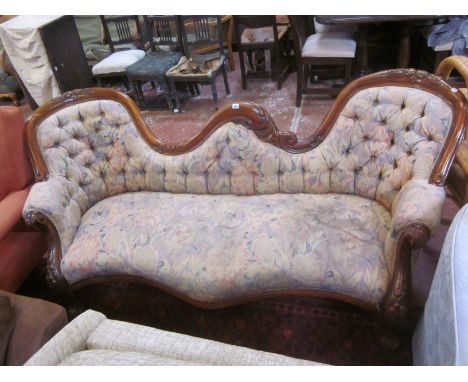 A Victorian style mahogany framed and button back sofa 