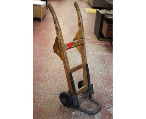 A set of vintage style wooden sack trucks