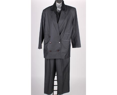 A 1987 Sheilagh Brown jacket and trouser suit; with a two-piece blue/grey suit, UK size 8; a 1980s Michiko Koshino buttoned p