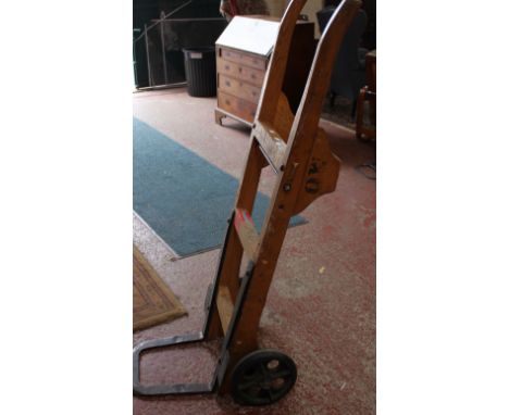 A set of vintage style wooden sack trucks
