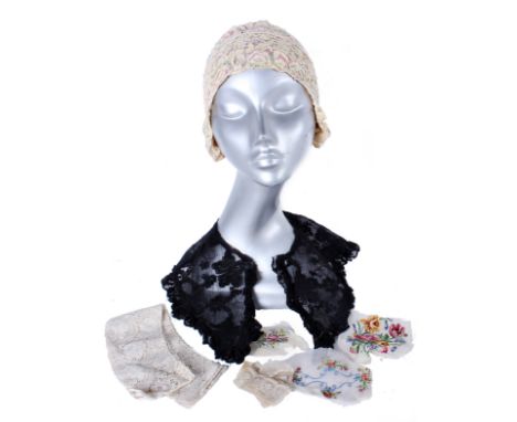 A black lace collar; with a lace bonnet from circa 1910; and six pieces of lace and embroidered fabricProvenance: Owned and w