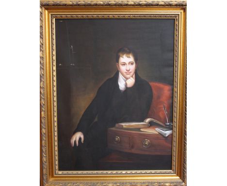 A modern oil on canvas, portrait of a young boy seated with books, unsigned, 63.5cm x 49cm 