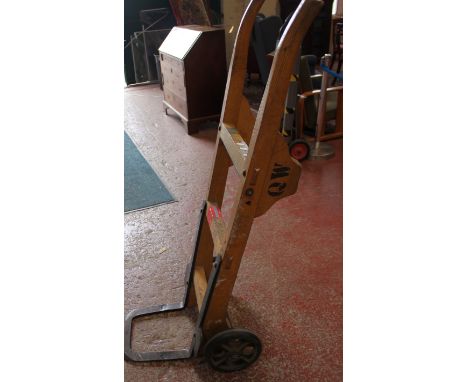 A set of vintage style wooden sack trucks