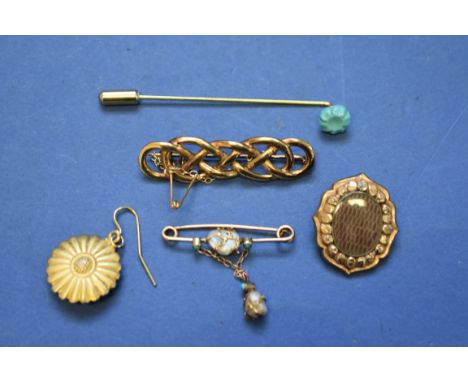 Three Victorian unmarked brooches; together with a turquoise stick pin; and a daisy earring.