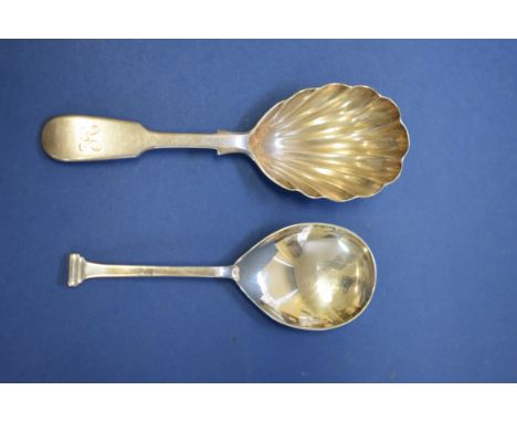 A Victorian silver caddy spoon, by Francis Higgins, London 1880; together with another example, by R E Porter, London 2000, 3