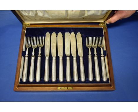 A cased set of twelve silver fish knives and forks, by Harrison Brothers & Howson, Sheffield 1928.