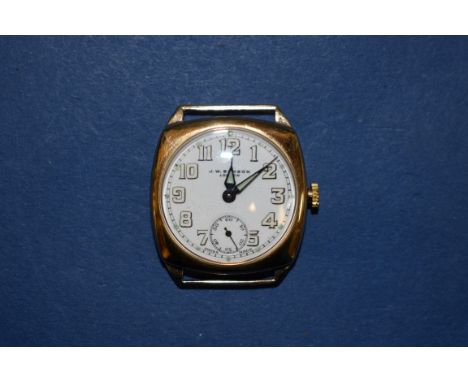 A vintage J W Benson 9ct gold gentleman's mechanical wristwatch, the white enamel dial having Arabic numerals and subsidiary 