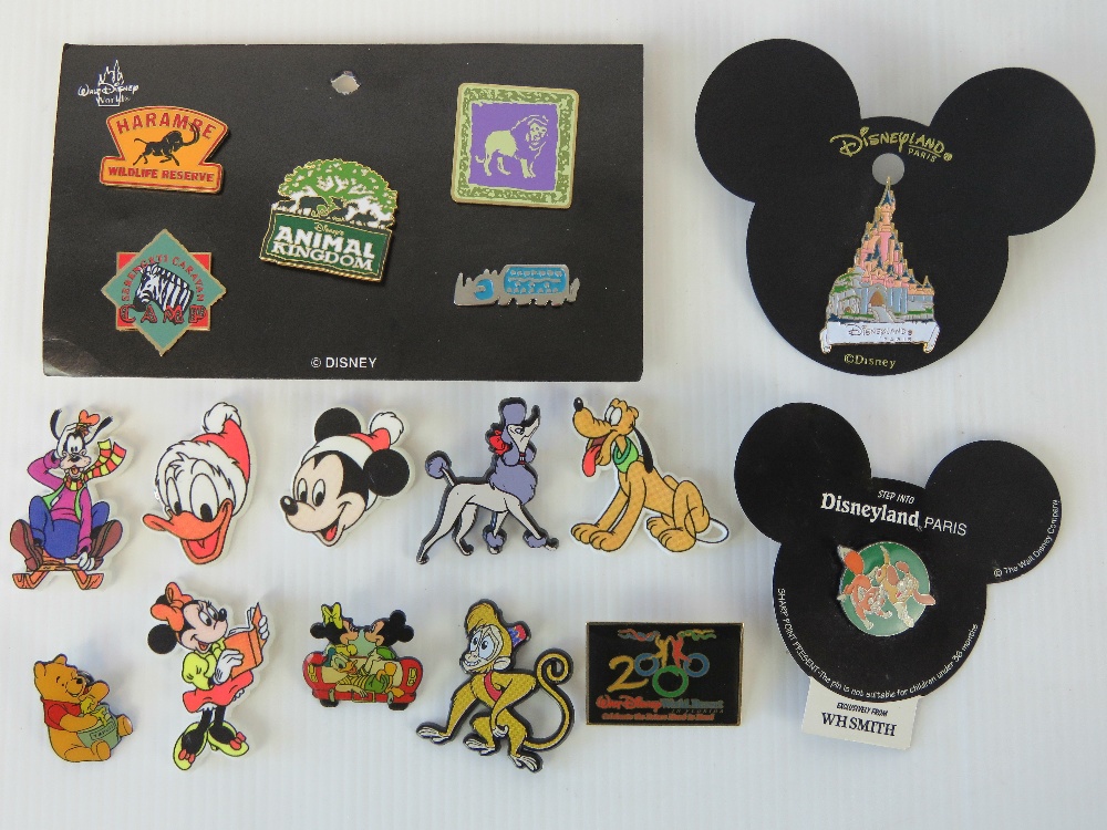 A quantity of Disney badges including; a set of Walt Disney Animal