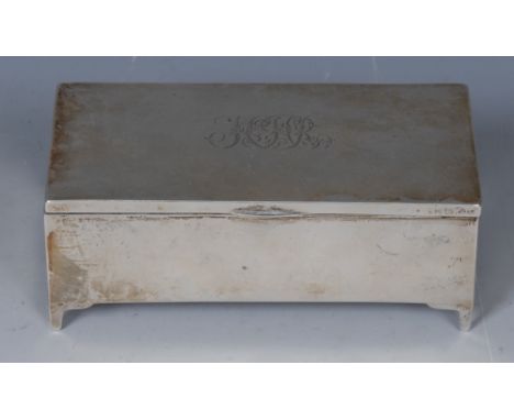 A George V silver rectangular dressing table box, hinged cover, bracket feet, 11.5cm wide, Lawrence Emanuel, Birmingham 1919