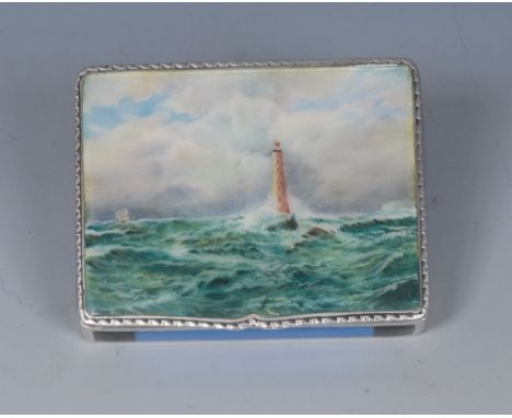 An early 20th century Continental silver rounded rectangular vanity box, hinged cover decorated in polychrome with a lighthou