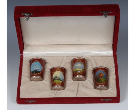 A set of four Russian enamelled silver toasting cups, each individually painted with oval panels of Sailing, Ship, River Land