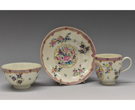 A Worcester teabowl, coffee cup and saucer, decorated in the Chinese Export manner with stylised flowers and foliage, in tone