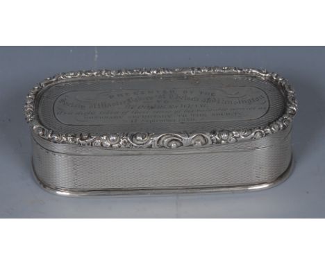 An early Victorian silver rounded rectangular snuff box, hinged cover with applied border of scrolling foliage, engine turned
