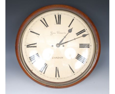 A Victorian mahogany circular wall clock, the 38.5cm white dial with Roman numerals, twin winding holes, inscribed Geo Charle