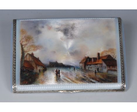 An early 20th century silver and enamel rounded rectangular snuff box, hinged cover decorated with a rural street, on a pale 